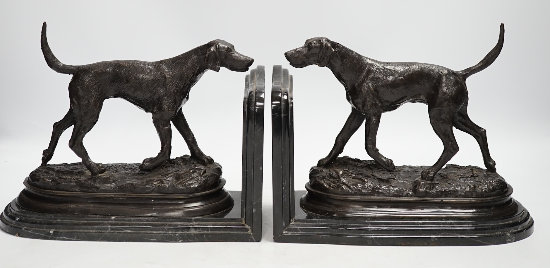 After Pierre-Jules Mêne (1810-1879), a pair of bronze models of hunting hounds